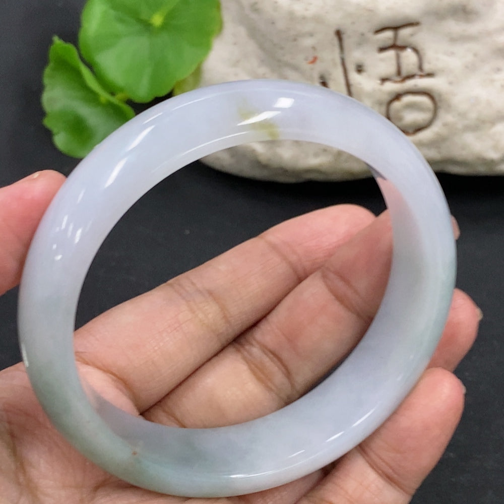 HKHQ jadeite round bracelet weighing 64.3g with a 59.4mm size, featuring polished jade gemstone beads.