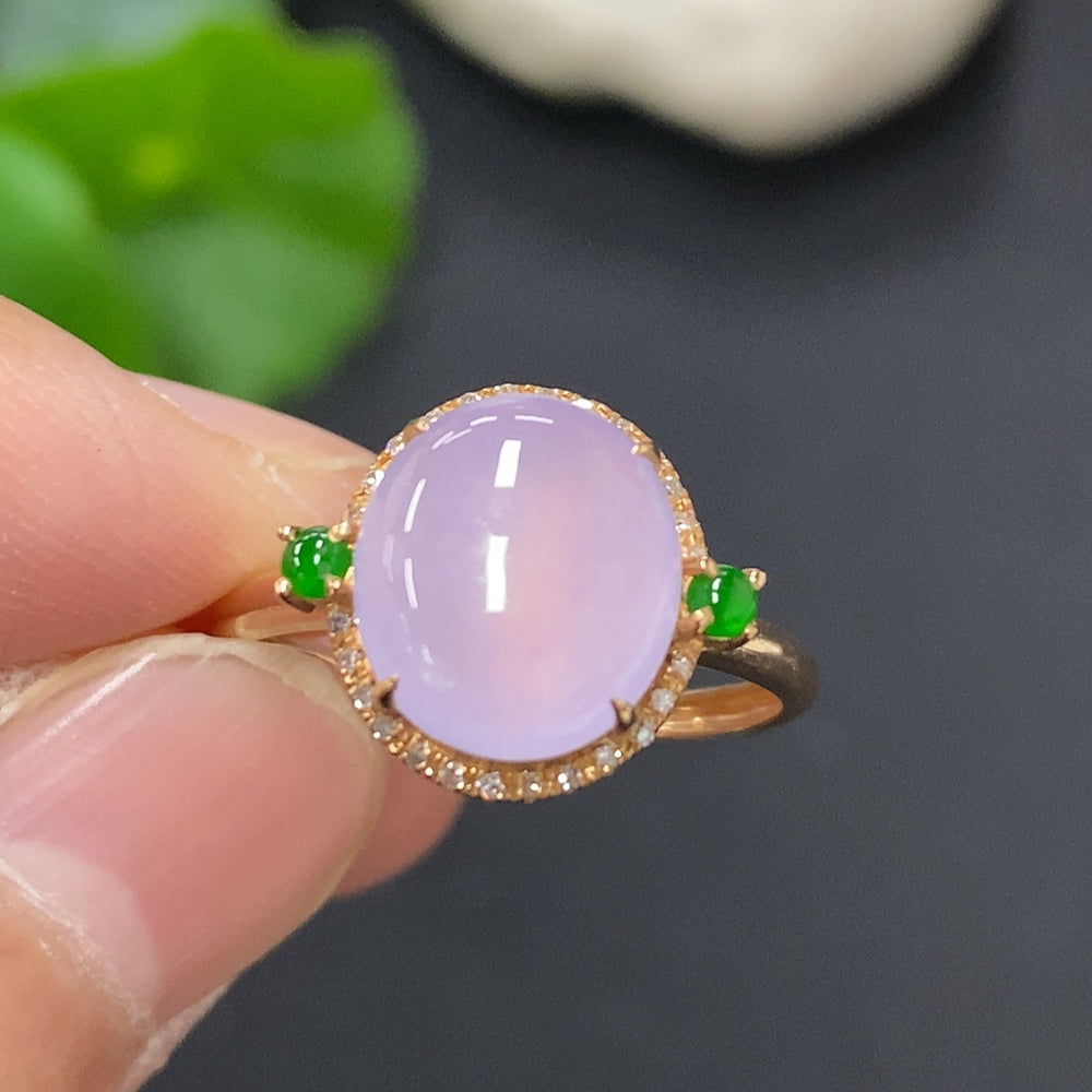 Jadeite cabochon ring with 18K gold band, accented with small diamonds, size 13, weighing approximately 2.6 grams.