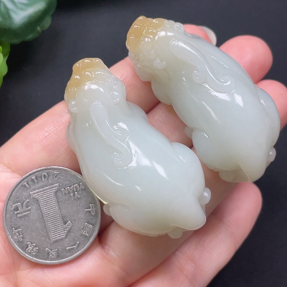 Hetian Jade Pixiu pendant from HKHQ, featuring intricate carvings and a total weight of approximately 73.49g, displayed against a neutral background.