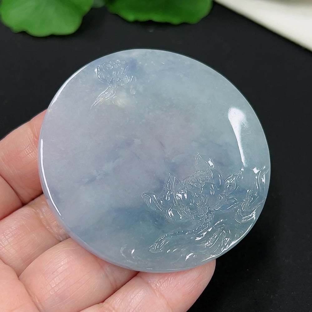 Jadeite lotus pendant with intricate carving, weighing approximately 39.4g, crafted by HKHQ, showcasing detailed jade craftsmanship.