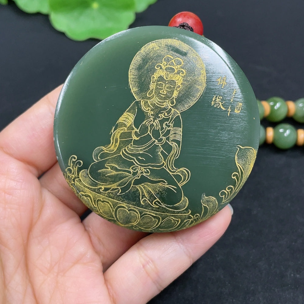 Hetian jade Avalokitesvara pendant with matching beads, weighing 157.4g including chain, from HKHQ, featuring detailed carved design.