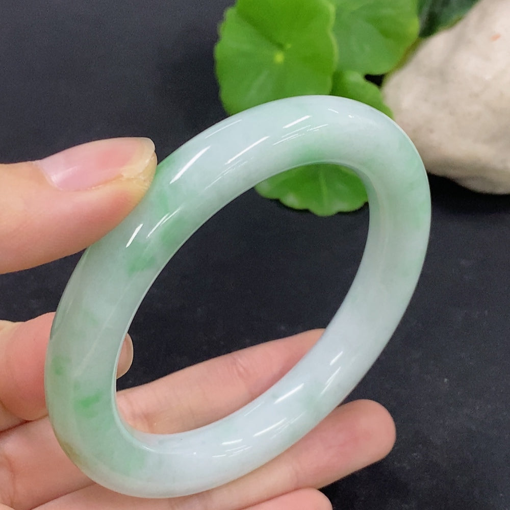 HKHQ jadeite round bangle, size 56, weighing approximately 62.4g, featuring smooth, polished jade surface and elegant round design.