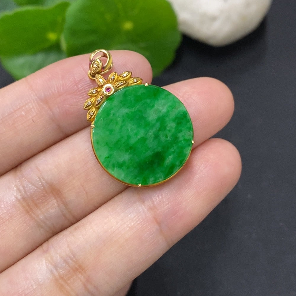 Jadeite plain pendant with 18K gold mount and diamond accents, shown on a necklace chain, highlighting elegant jewelry craftsmanship.