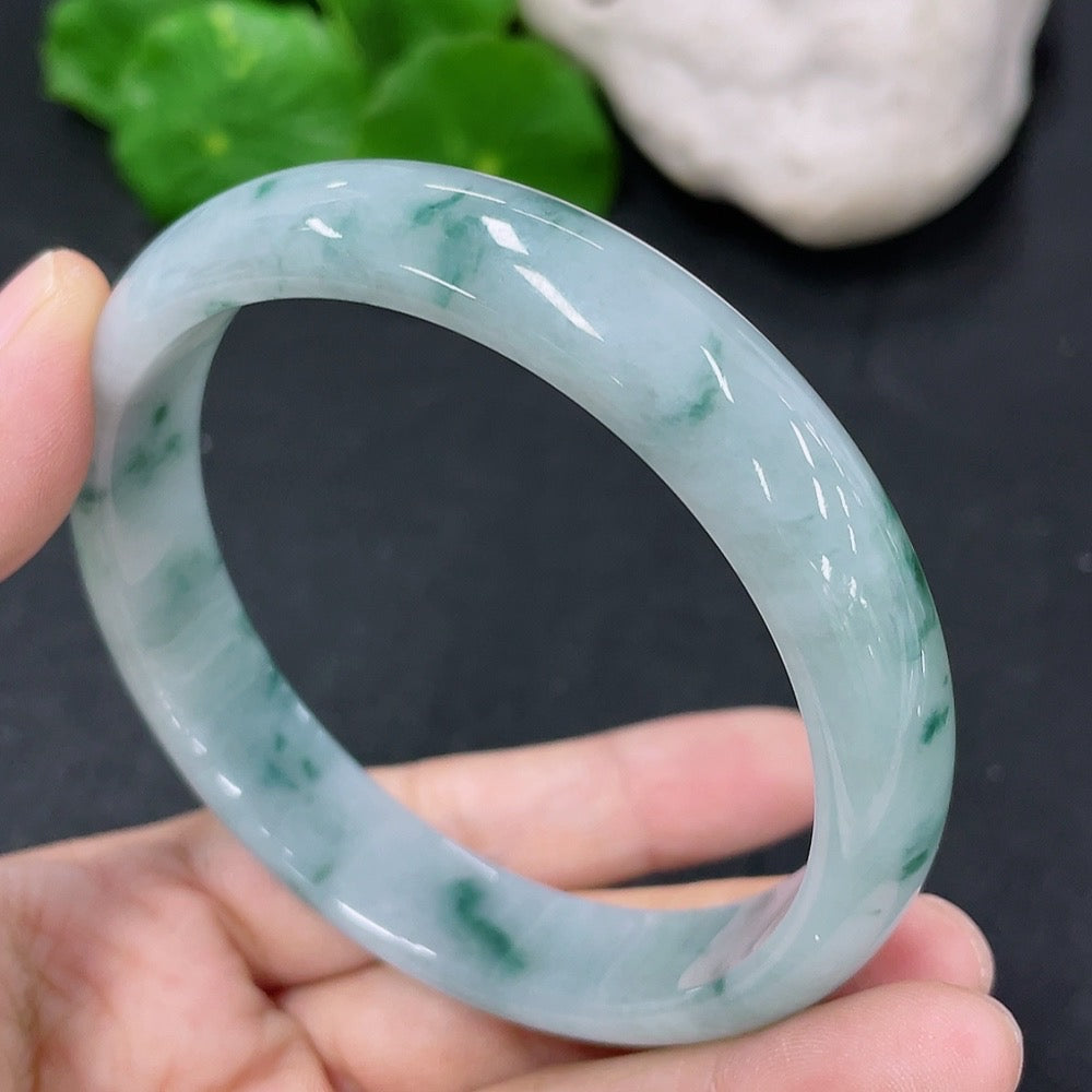 Jadeite round bracelet with a 59.5mm diameter, weighing approximately 48 grams, featuring smooth, polished jade stones.