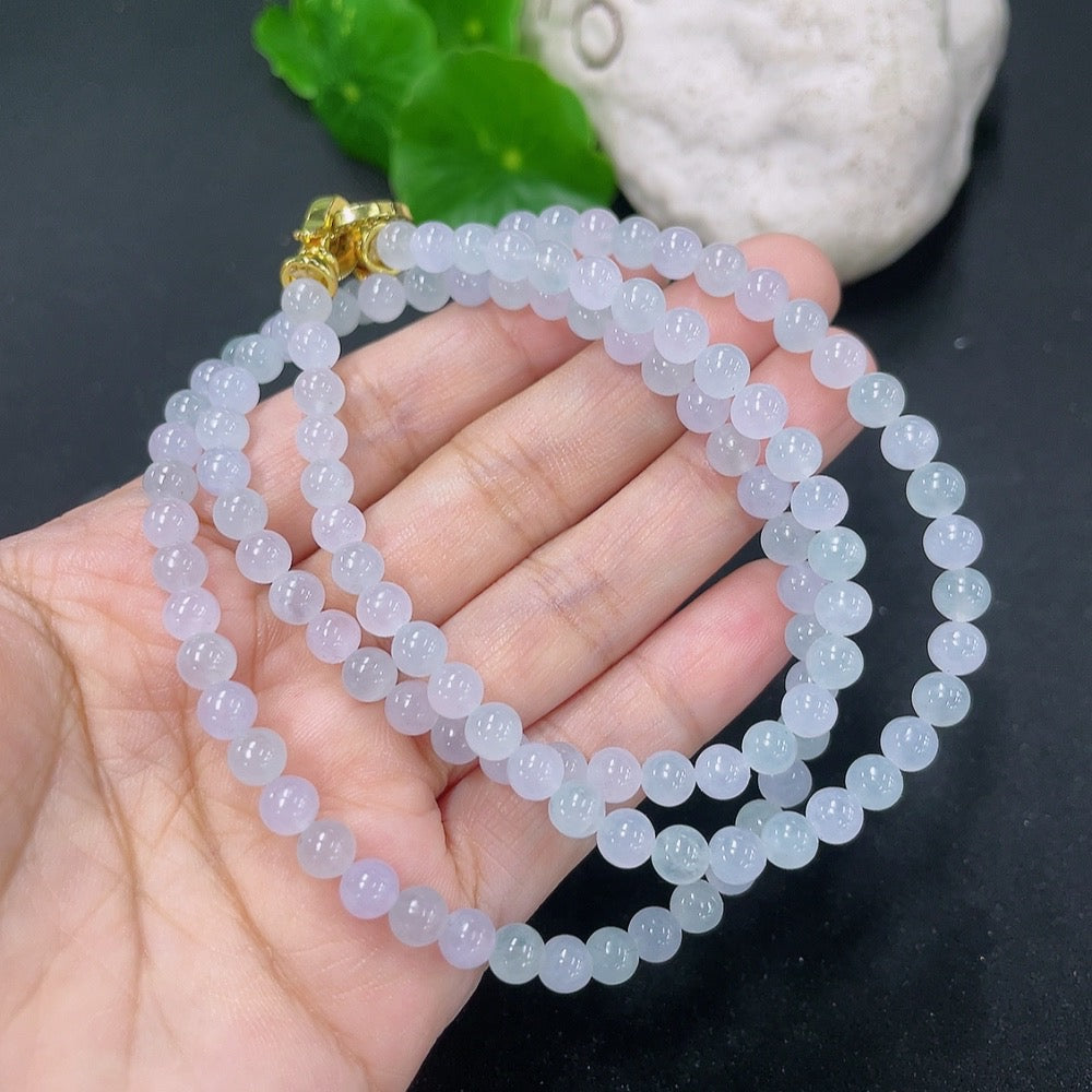 Jadeite bead necklace with 5.2mm jade beads, non-gold, weighing approximately 32.1g, showcased in a close-up image.