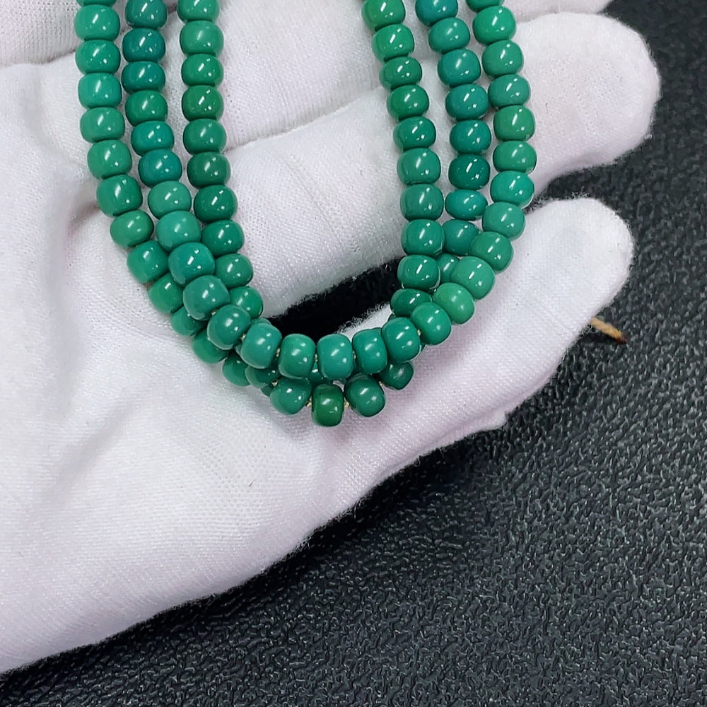 Turquoise gemstone bead strand with 4.8mm beads, approximately 18.28g, from HKHQ, showcasing vibrant blue color and natural luster.