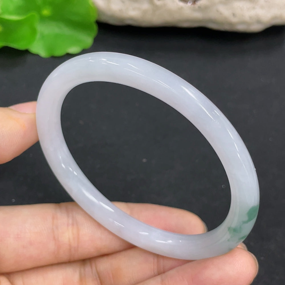 Jadeite Concubine Bracelet by HKHQ featuring smooth, polished green jade beads on an elegant bracelet.