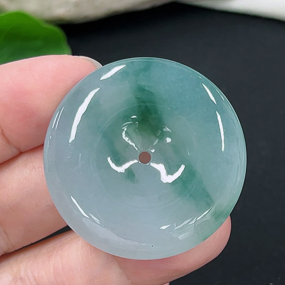 Jadeite Peace Knot pendant from HKHQ, showcasing a smooth, polished jade pendant with intricate knot design, weighing approx. 18.9g.