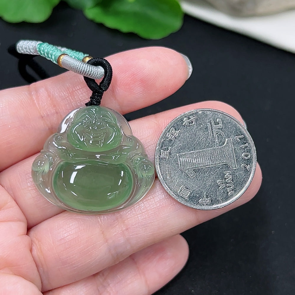 Jadeite Buddha pendant with carved Buddha figure on a rope, weighing approximately 9.2g, showcasing smooth green jade from HKHQ.