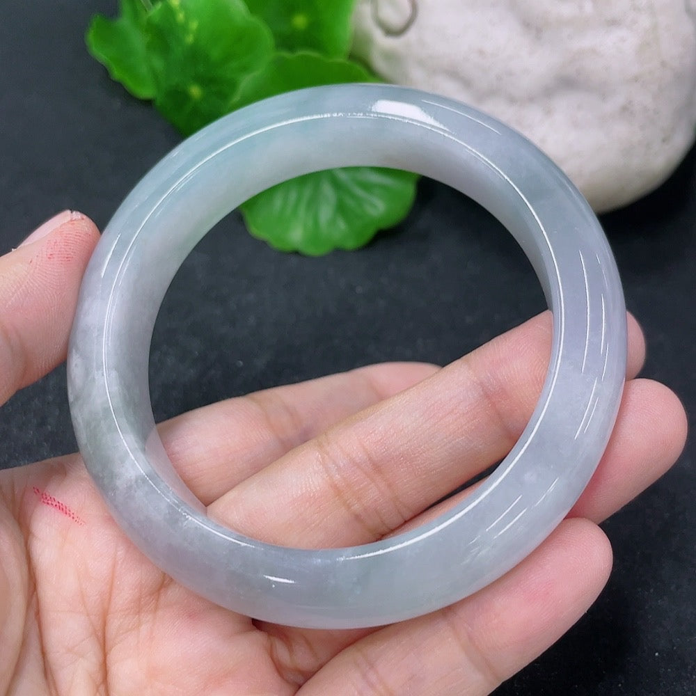 Jadeite round bracelet with 54mm diameter, weighing approximately 59.81g, featuring smooth, polished jade stones.