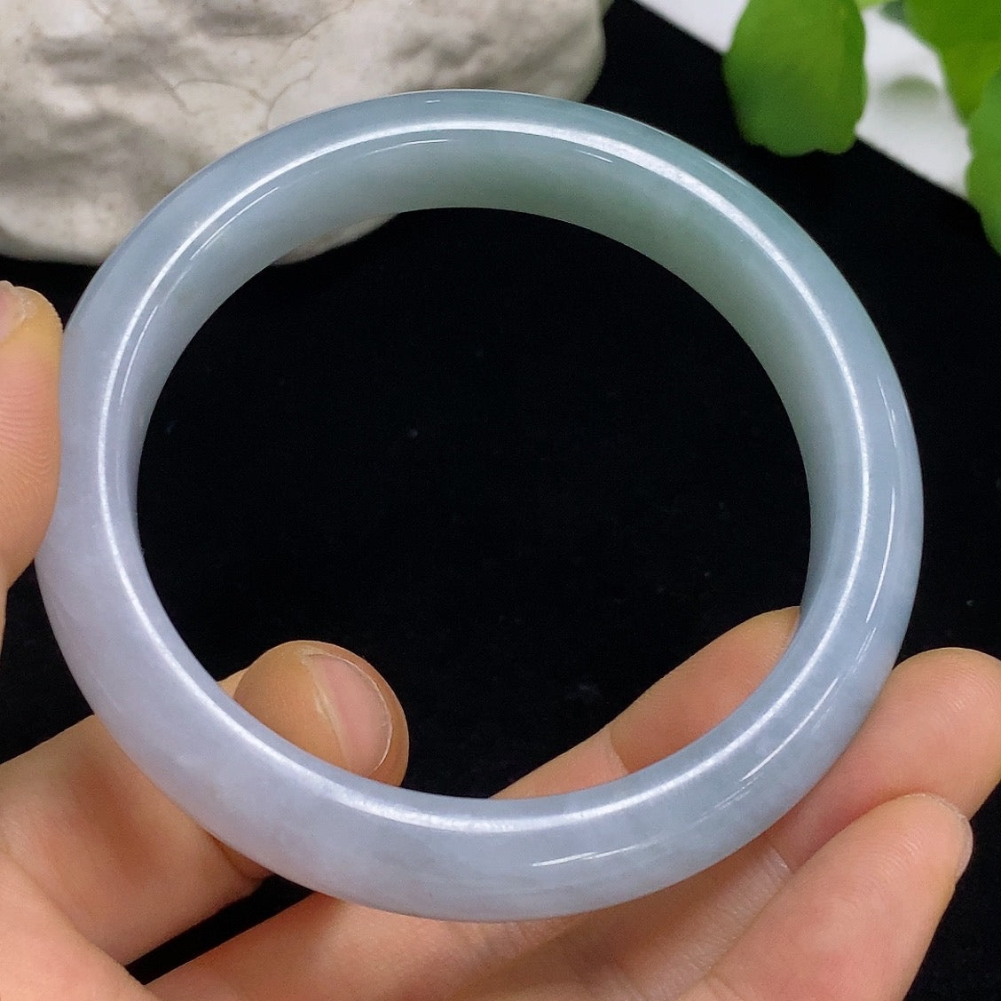 HKHQ jadeite round bangle, size 57.5, polished jade jewelry with a smooth, glossy finish, weighing approximately 57.64 grams.
