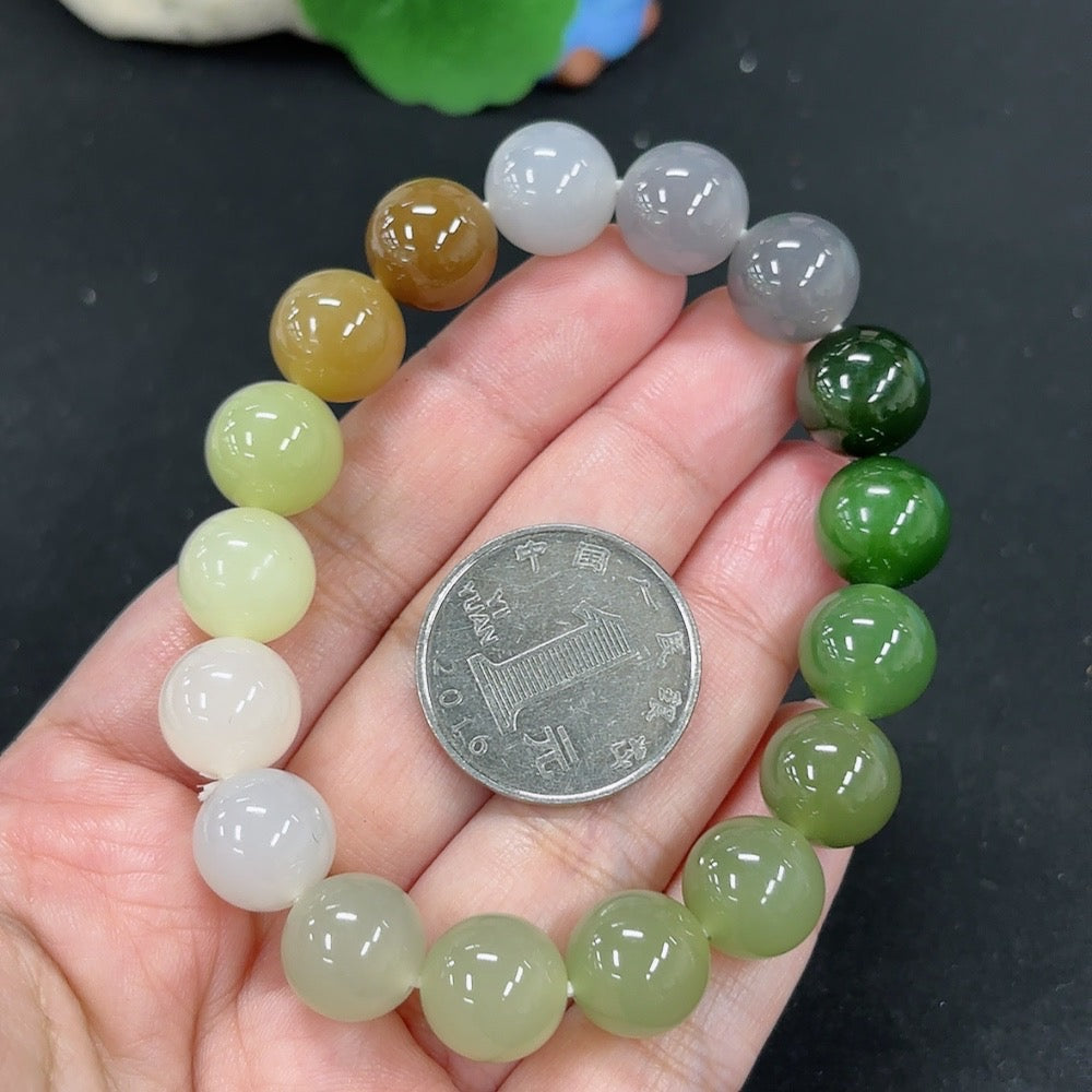 HKHQ Hetian Jade bracelet weighing 45.6g, featuring smooth polished jade beads and a classic, elegant design.