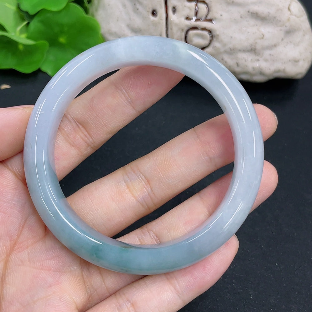 HKHQ jadeite round bangle with a 54.4mm size and 49.3g weight, featuring smooth, polished jade surface.