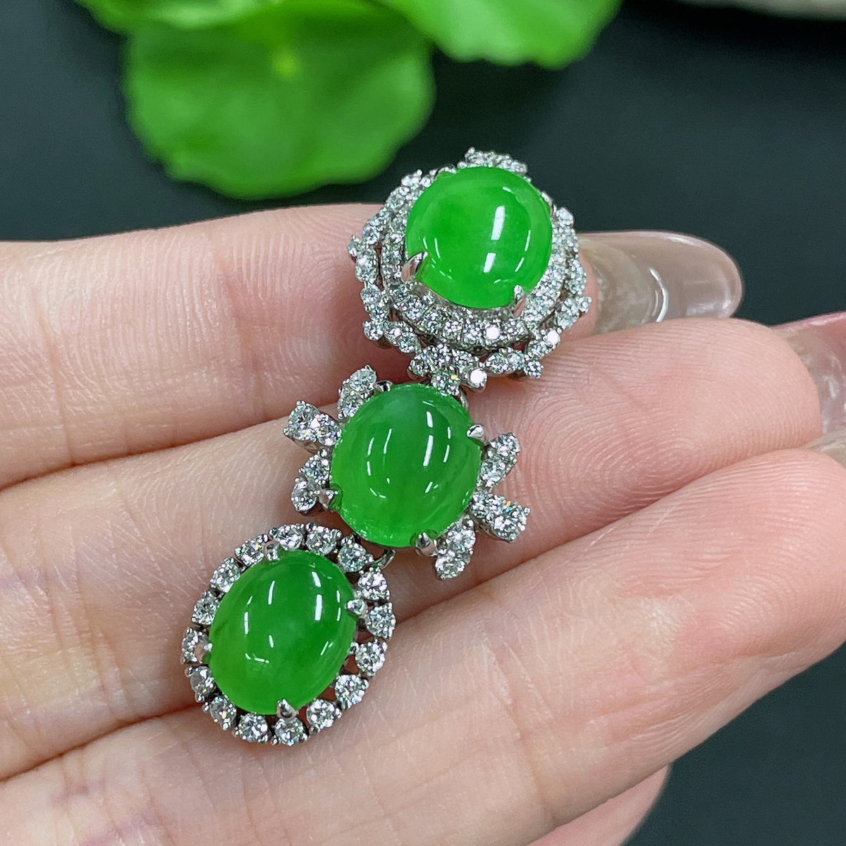 Jadeite pendant with 18k gold inlay and diamond accents, crafted by HKHQ, showcasing a smooth, polished jade gemstone.