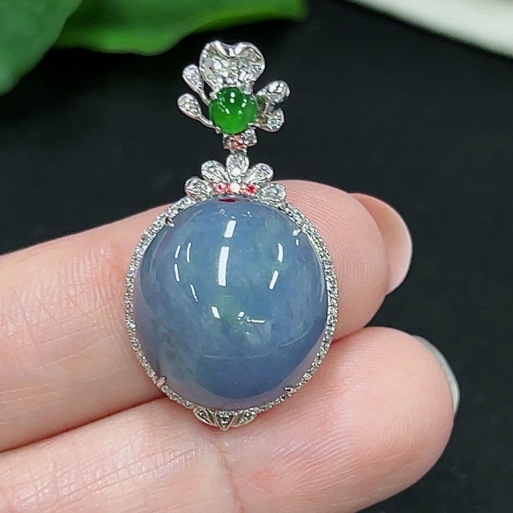 Jadeite cabochon pendant with 18k gold setting and four non-diamond accents, crafted by HKHQ, weighs approximately 5.45g