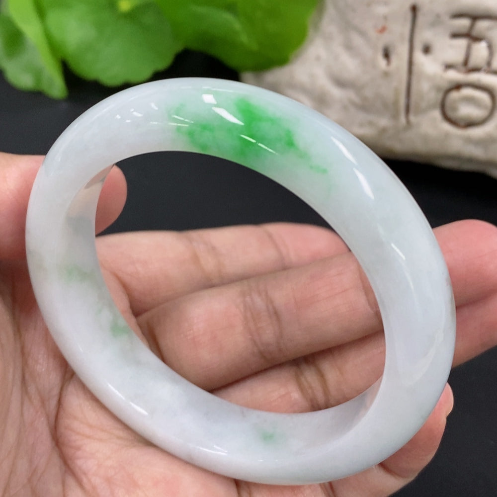 HKHQ Jadeite round bangle in size 52.7 with a weight of 53.25g, showcasing smooth, polished jadeite craftsmanship.