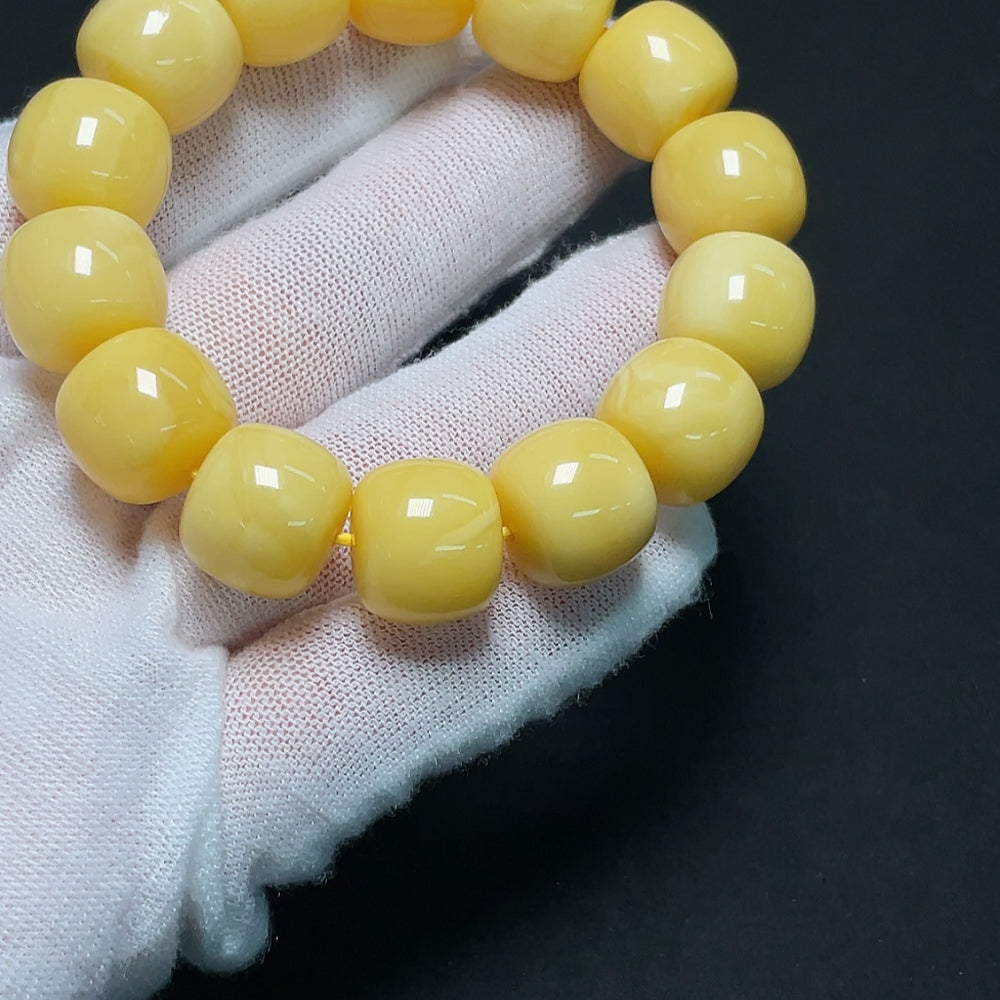Amber Beeswax Bracelet featuring natural amber beads, approximately 13.8mm in size, weighing around 22.64g, by HKHQ.