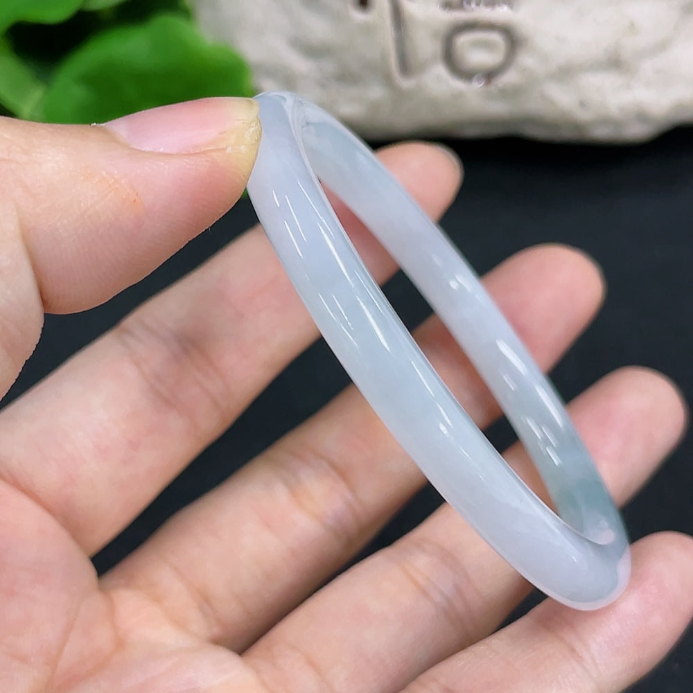 Elegant Jadeite Concubine Bracelet by HKHQ featuring smooth, polished jadeite beads on a delicate string.