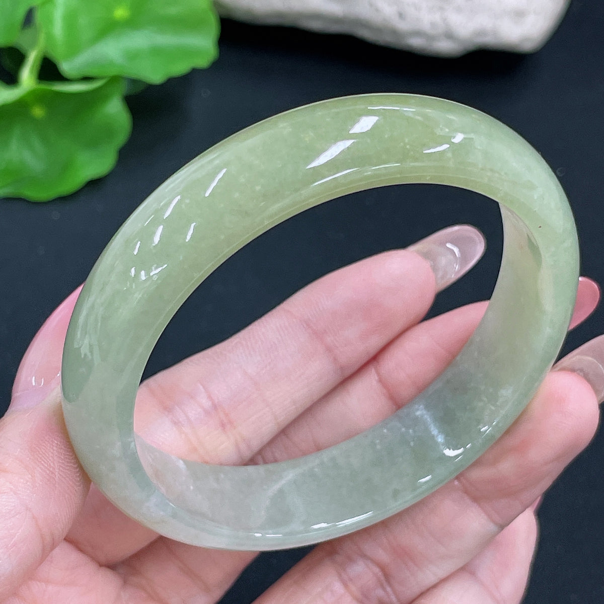 Jadeite round bracelet by HKHQ with a total weight of 51.42g and size 56.8, featuring smooth jadeite beads on a string.