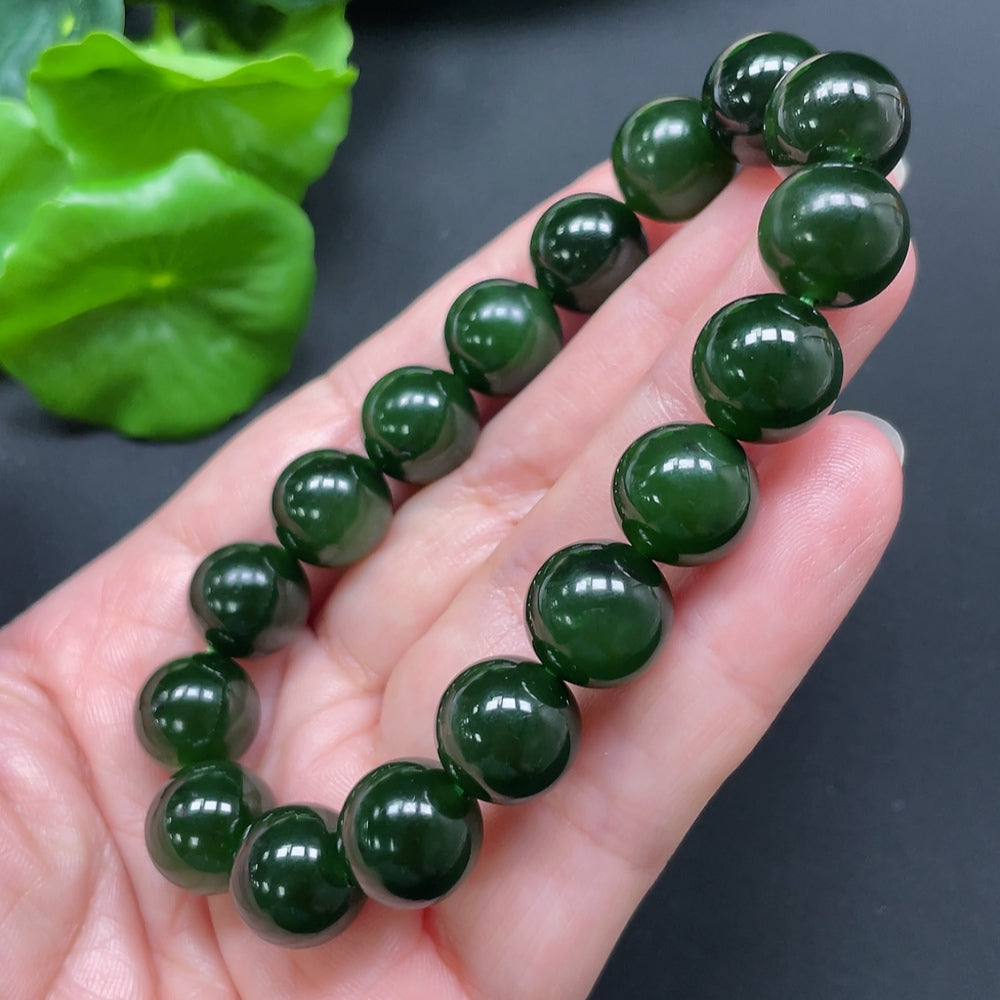 HKHQ Hetian Jade bracelet with 11.9mm beads, weighing approximately 45.24g, showcasing smooth, polished jade stones.