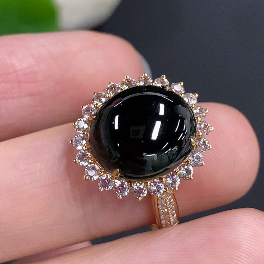 Jadeite cabochon ring with 18K gold (only the smallest accent stones are diamonds)