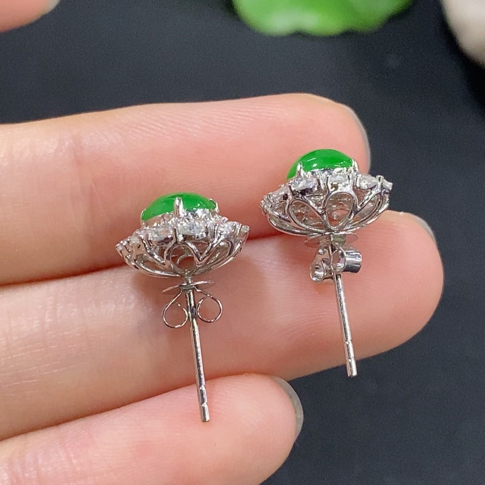 Jadeite earrings with 18k gold and diamond accents, showcasing elegant green jade stones and sparkling diamond details.