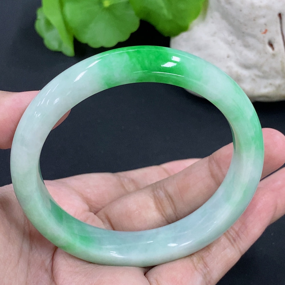Jadeite round bracelet weighing approximately 54.97g with size 56.9, featuring smooth green jade beads from HKHQ.