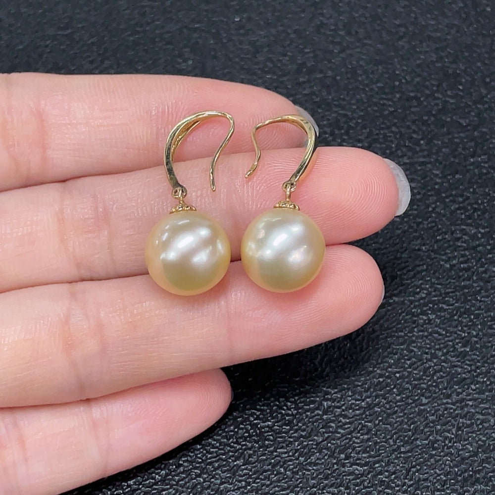 HKHQ seawater pearl earrings with gold, 11.2mm pearls, weighing 5.37g, natural color, elegant jewelry with gold accents.