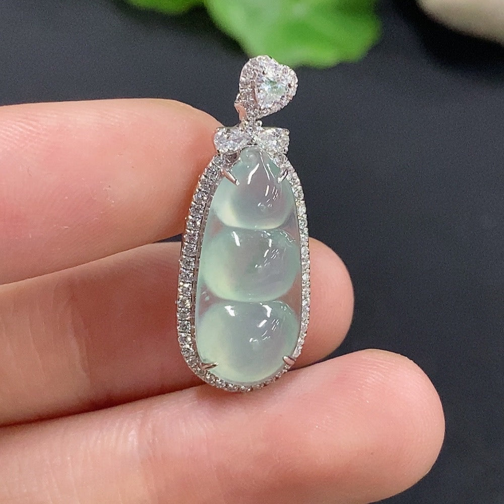 Jadeite lucky bean pendant with inlaid design, 18k non-diamond, crafted by HKHQ, weighs approx. 2.68g, showcasing detailed jade craftsmanship.