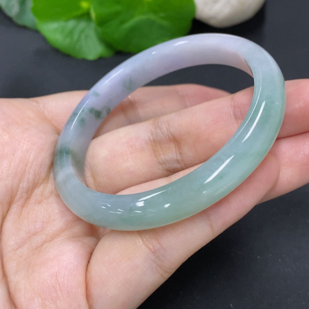 Jadeite round bangle in size 51.9 with approximately 28g weight, crafted by HKHQ, featuring smooth, polished jade surface.
