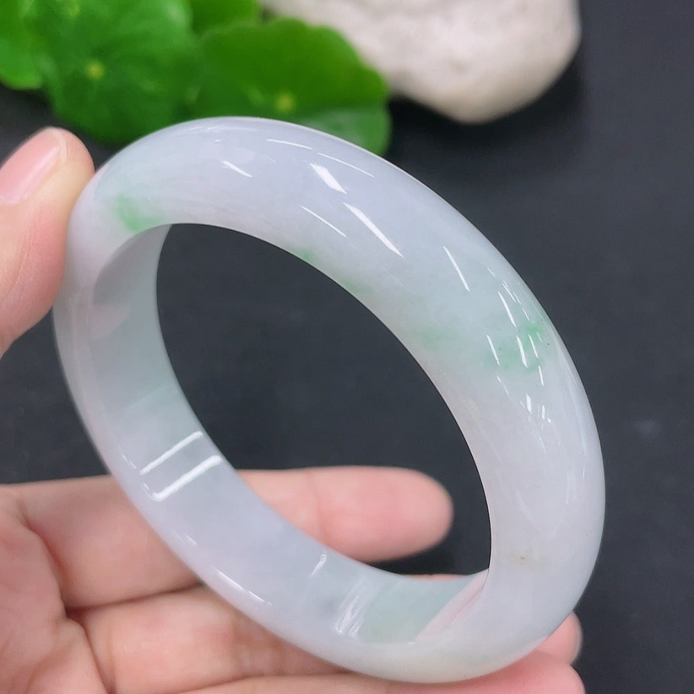Jadeite round bracelet with 53mm diameter, crafted by HKHQ, featuring smooth, polished jadeite stones in a circular design.