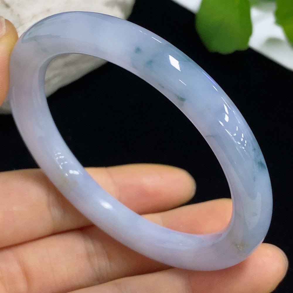 Jadeite round bangle from HKHQ, weighing 40.06g, size 55.6, featuring smooth, polished jadeite with a glossy finish.