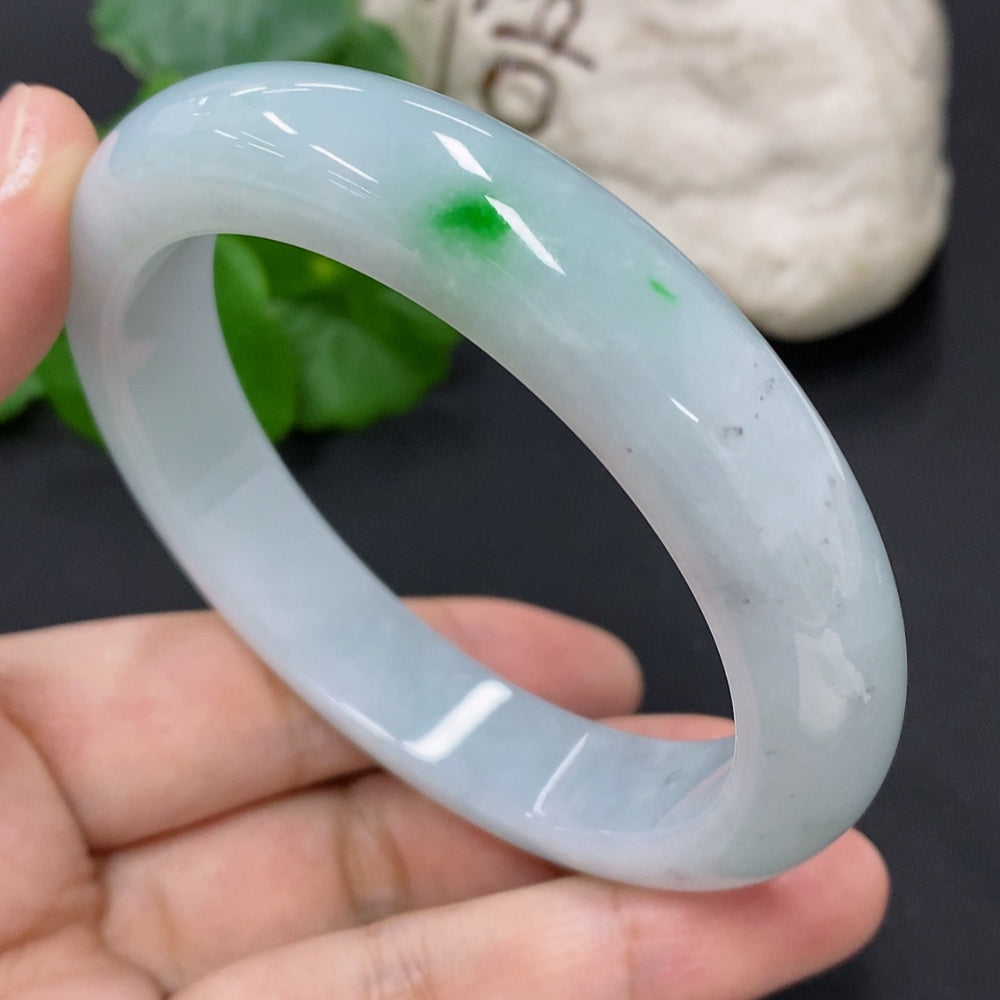 Jadeite round bangle in size 59.2 with a total weight of 69.6g, showcasing smooth, polished jadeite from HKHQ.