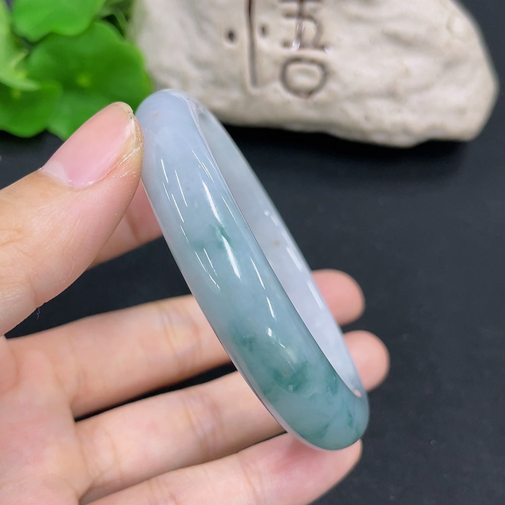 HKHQ jadeite round bangle, 54.4mm size, weighs approx. 49.3g, smooth green jade bracelet with polished finish.