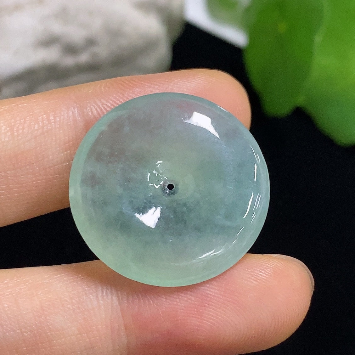 Jadeite safety buckle pendant with intricate jade design, crafted by HKHQ, showcasing smooth green jade stone and detailed craftsmanship.