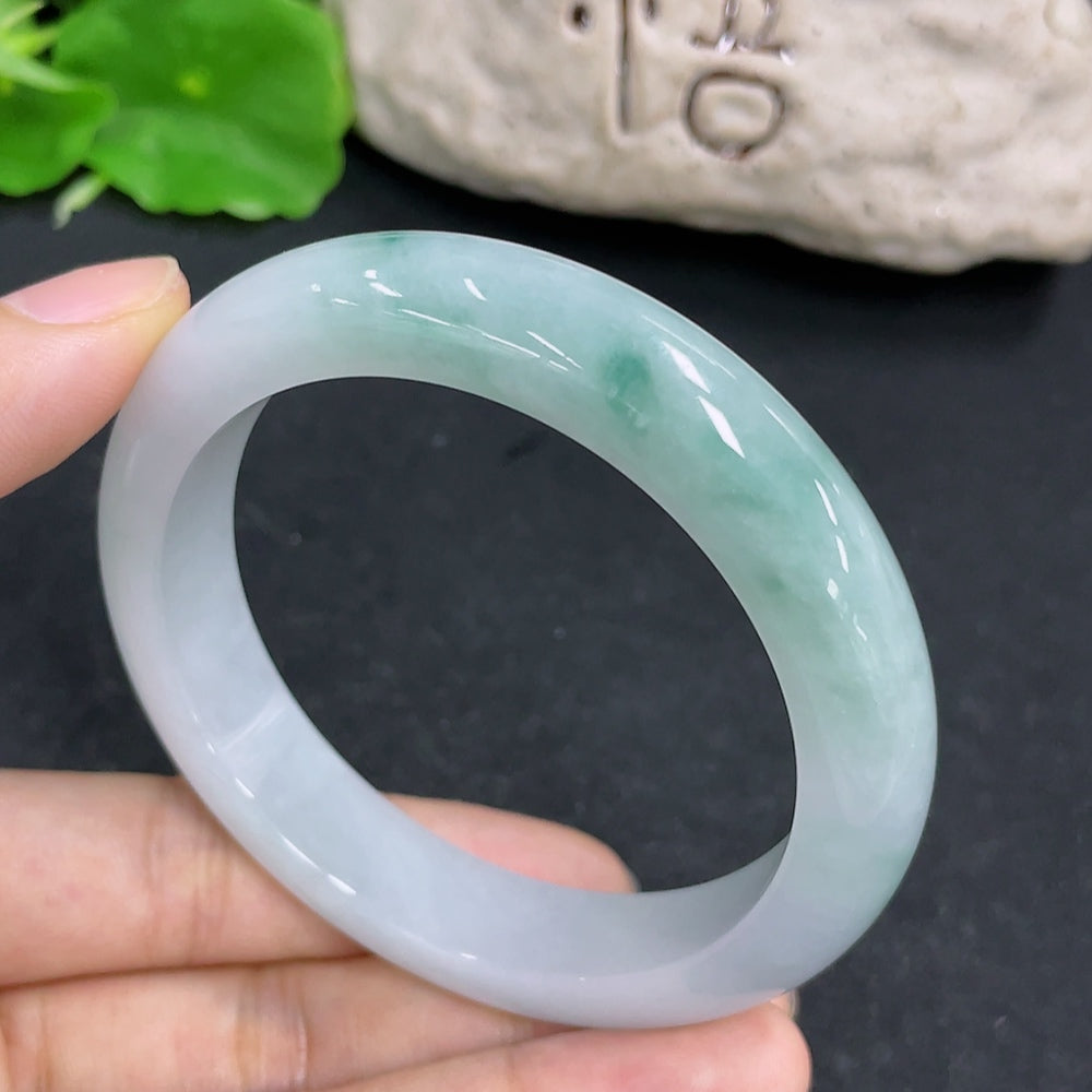 Jadeite round bracelet from HKHQ featuring smooth green jade stones, weighing approximately 58.6g, size 56.5.