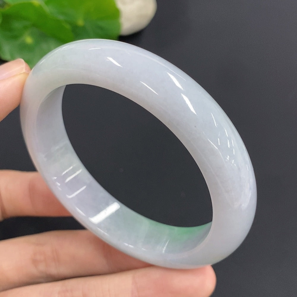 HKHQ jadeite round bangle, 61.2g, size 57, showcasing smooth, polished jadeite with a glossy finish.