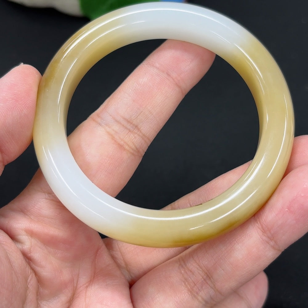 HKHQ Hetian jade round bracelet, size 54.6, weighing approx. 50.8g, showcasing smooth, polished green jade beads.