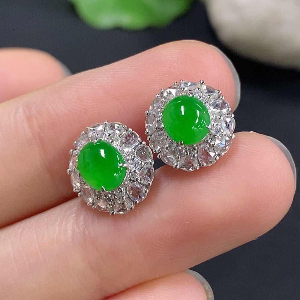 HKHQ Jadeite earrings with 18k gold and diamond accents, featuring smooth green jade stones and elegant gold detailing.