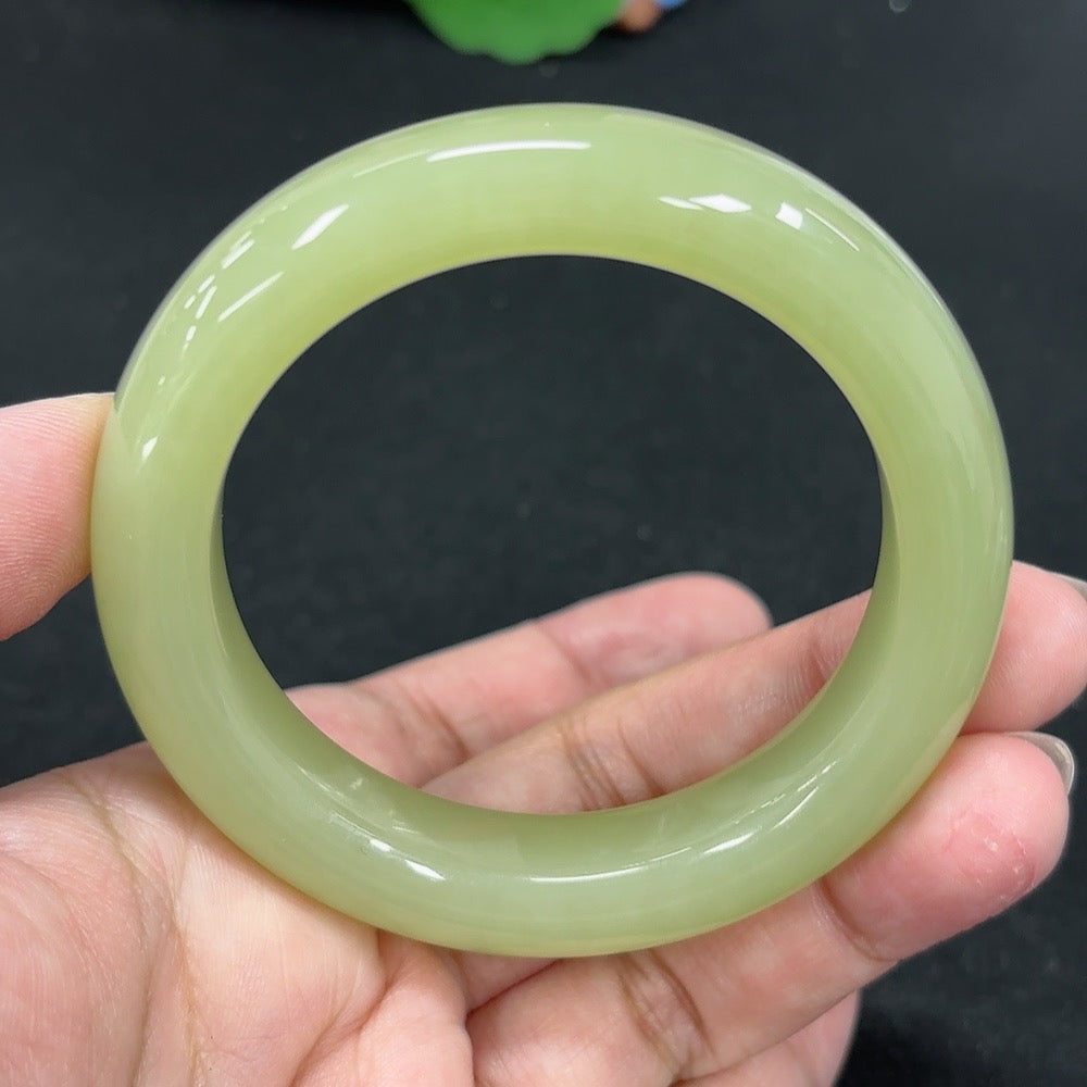 HKHQ Hetian Jade round bracelet with 53.1mm size and 62g weight, showcasing smooth, polished green jade beads.