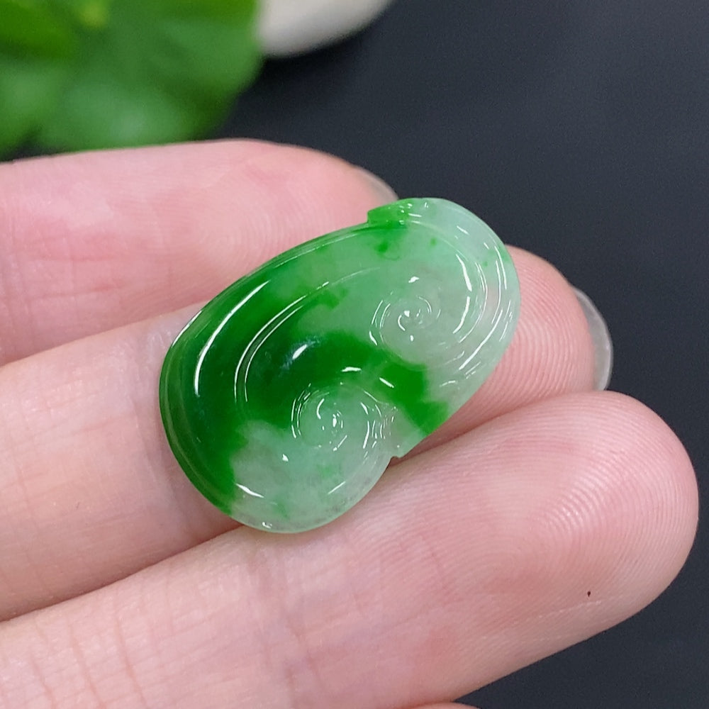 Jadeite Ruyi inlaid piece, lightweight at 1.4g, with intricate details, crafted by HKHQ, showcasing fine jade craftsmanship.