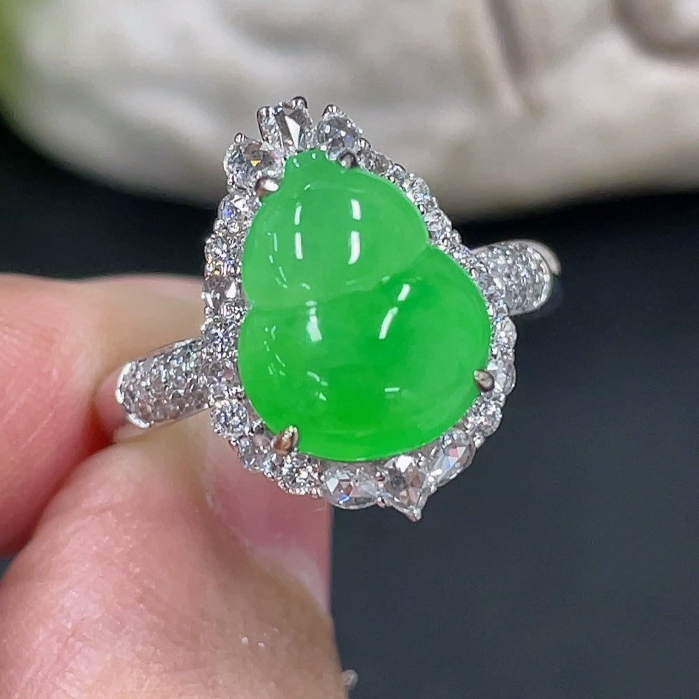 HKHQ Jadeite gourd inlaid ring with 18K gold setting and diamond accent, showcasing intricate craftsmanship and elegant design.