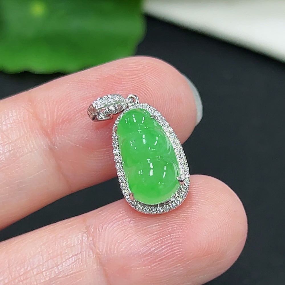 Jadeite lucky bean pendant with diamond accents, 18K gold, by HKHQ, showcasing the detailed green jade gemstone and gold setting.