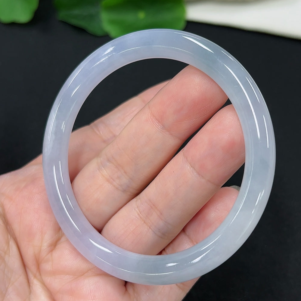 Jadeite round bangle in size 54.7 with a total weight of 27.7g, featuring smooth, polished jadeite from HKHQ.
