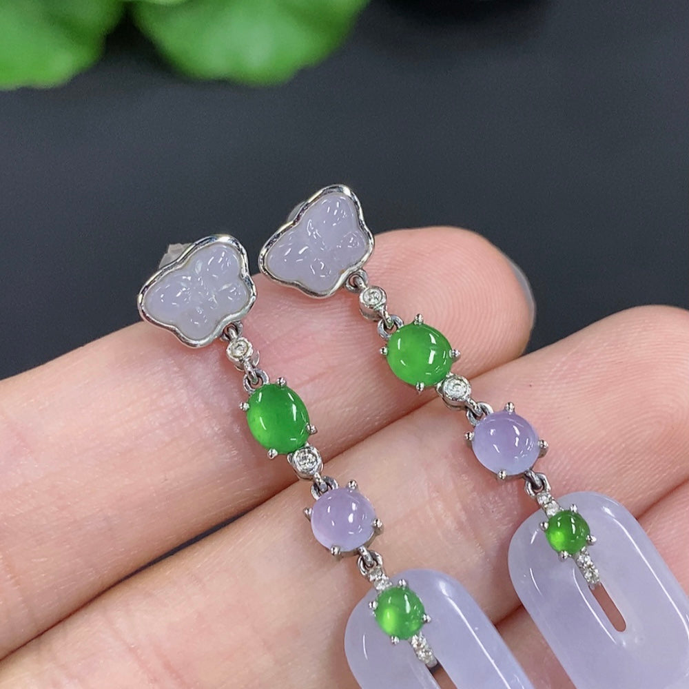 HKHQ jadeite earrings set in 18k gold with diamond accents, featuring elegant gemstone and metal details.
