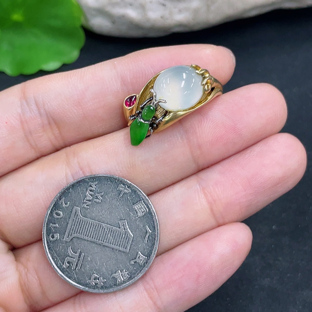Elegant jadeite ring with 18k gold setting, size 14, weighing approximately 9.5g, showcasing smooth, polished jade gemstone.