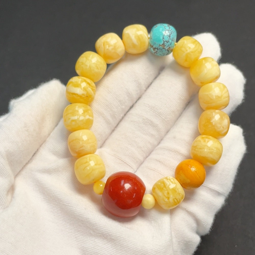Amber beeswax bracelet with red gemstone, organic matter details, HKHQ brand, 11.7mm width, weighs approx. 24.23g.