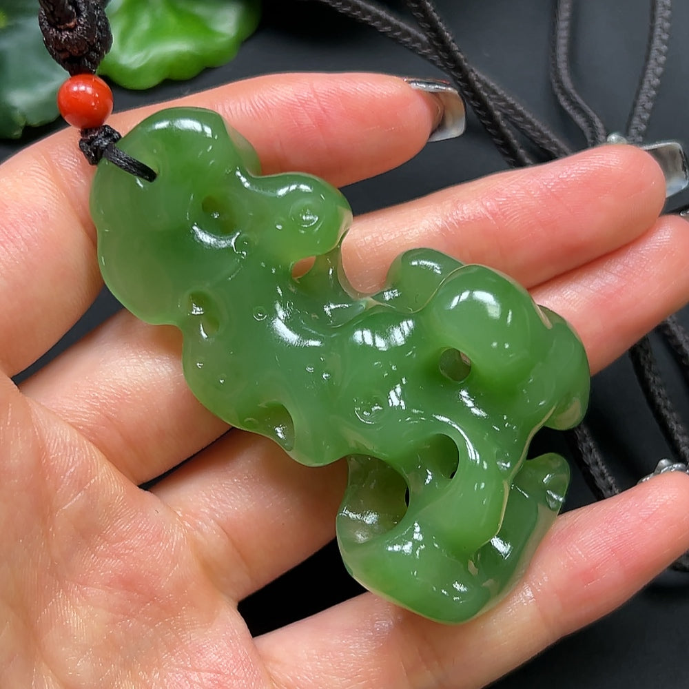 HKHQ Hetian jade and coral stone pendant necklace with rope, approximately 48.17g, featuring a detailed natural gemstone design.