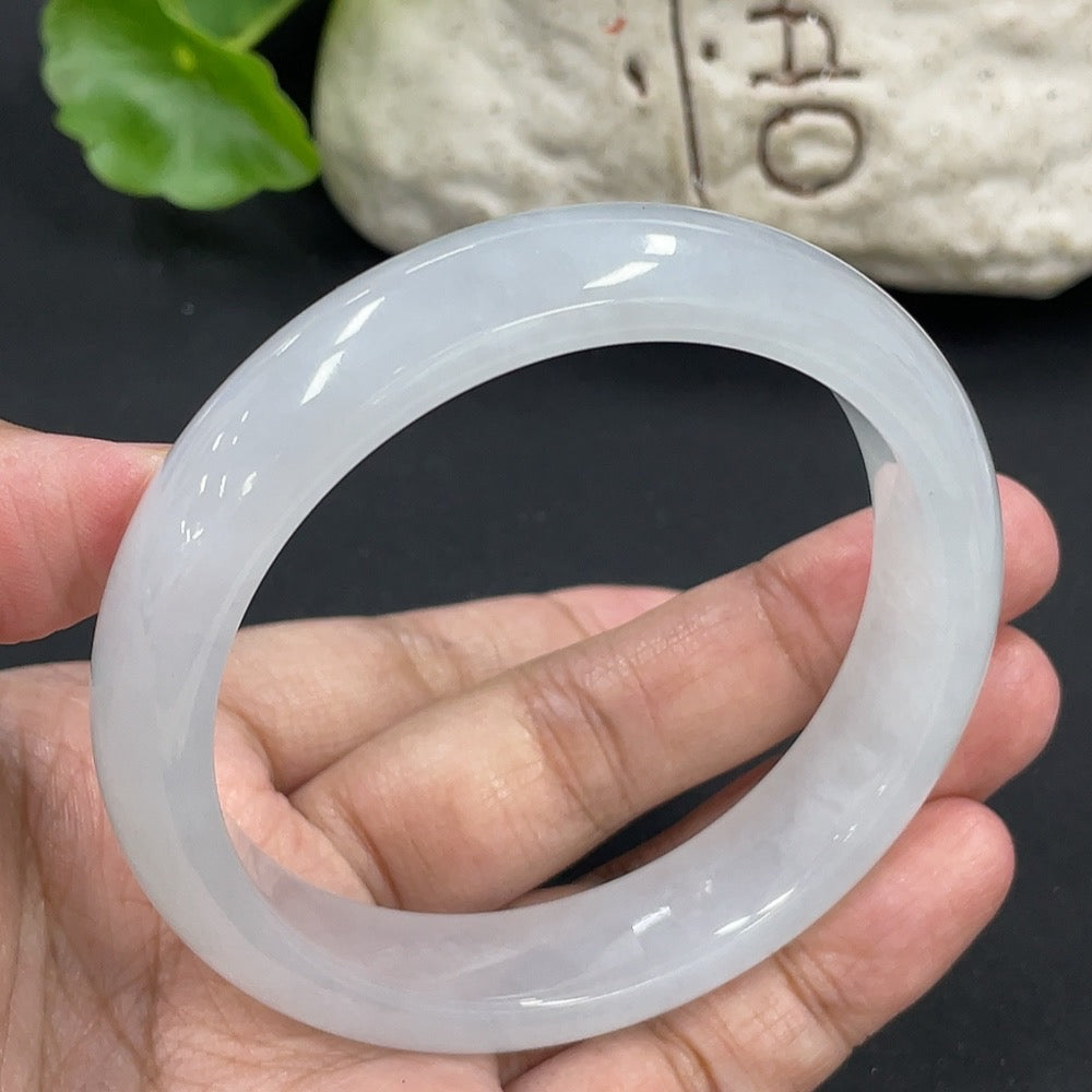 HKHQ jadeite round bangle bracelet with 57.5mm diameter and 58.27g weight, showcasing smooth, polished jadeite surface.