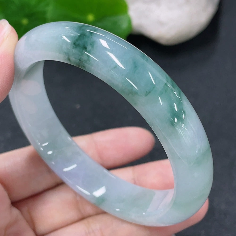 HKHQ jadeite round bangle with a size of 54.7mm and weight of 52.26g, featuring smooth, polished jade surface.